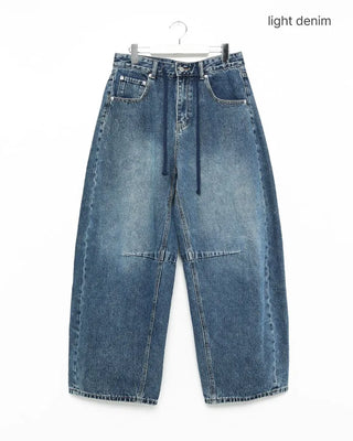 Pointed denim pants with contrasting panels