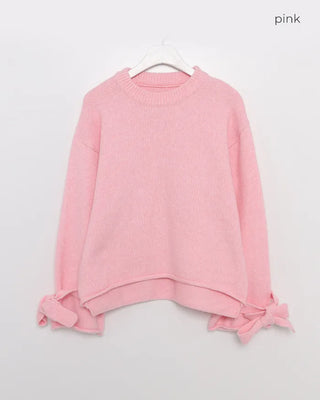 Knit sweater with ribbon detail on the sleeves
