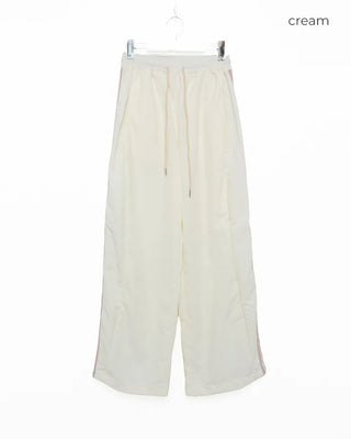 Wide-leg nylon jersey pants with hip pockets