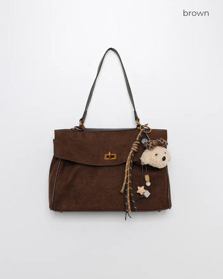 Suede gold buckle bag