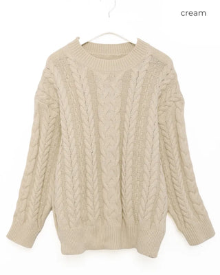 Loose-fitting cable knit round neck sweater