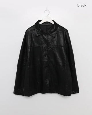 Two-tone leather jacket with contrasting sleeves.