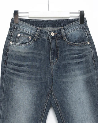 Low-waist point-washed flare jeans
