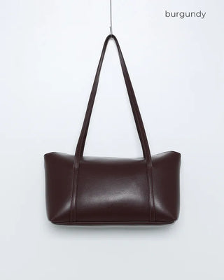 Slide pocket shoulder bag