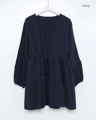 Shirred dress with strings