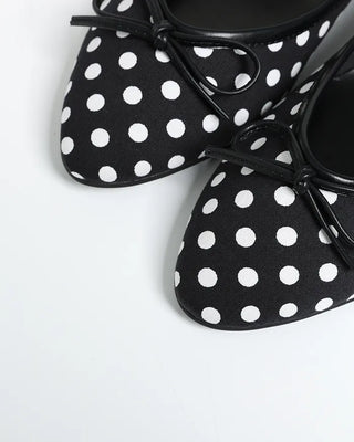 Polka dot almond toe pumps