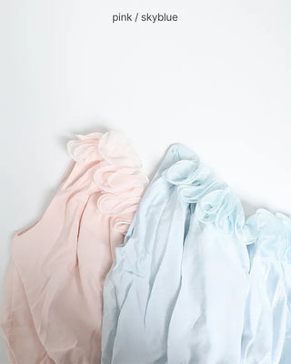 Asymmetrical ruffled sleeveless blouse