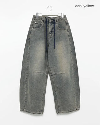 Pointed denim pants with contrasting panels