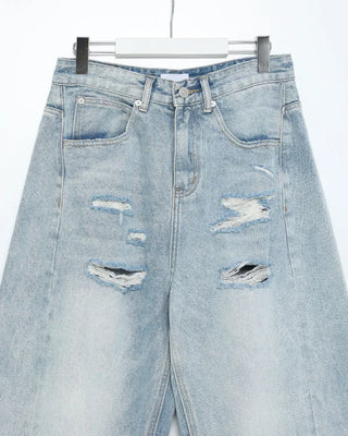 Distressed wide-leg denim