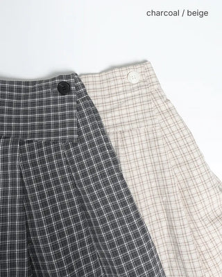 Checked pleated midi skirt