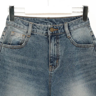 Knee-ripped denim pants