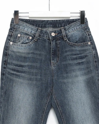 Low-waist point-washed flare jeans