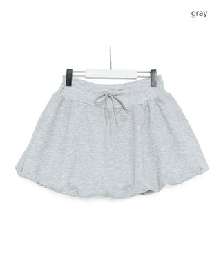 Voluminous elastic waist mini skirt
