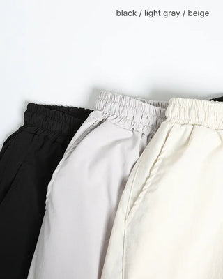 Side-tuck flap hip pocket easy pants