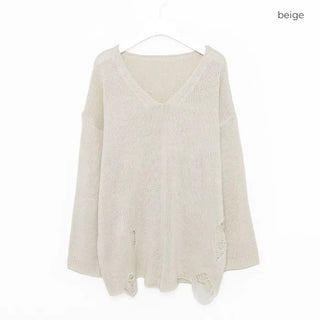 Distressed long knit sweater