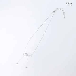 Ribbon motif necklace
