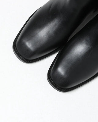 Side-seam almond-toe long boots