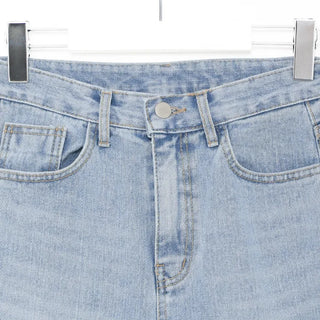 Distressed denim pants