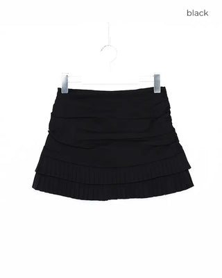 Shirred tiered pleated mini skirt