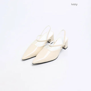 Pointed-toe strap heels