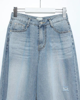 Distressed wide-leg denim pants