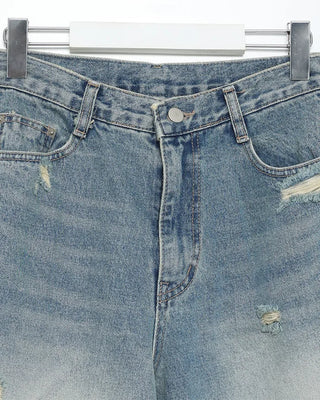 Distressed wide-fit denim pants