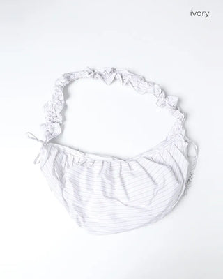 Striped half-moon shirred bag