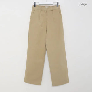 Brushed-back cotton pleated pants