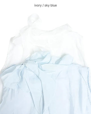 Sleeveless blouse with ribbon neckline