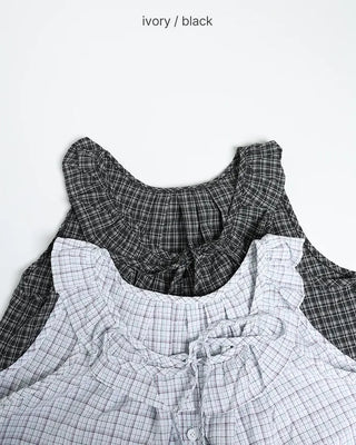 Checked ruffle sleeveless blouse