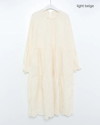 Long dress with neck lace detail and ruffles