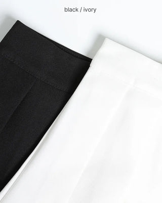 Double pleated mini skirt