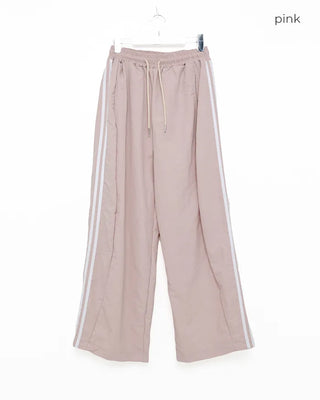 Wide-leg nylon jersey pants with hip pockets