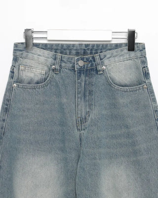 Knee-damaged vintage denim pants