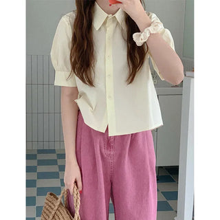 Feminine pleated blouse