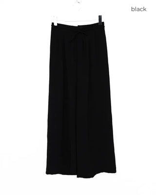 Two-button strap slacks