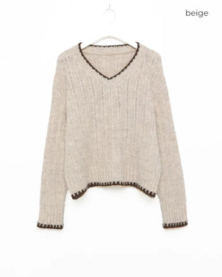 V-neck two-tone cable knit sweater