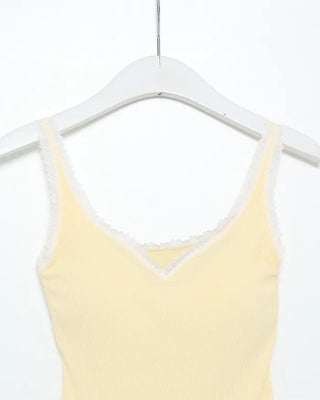 Sleeveless top with lace cap