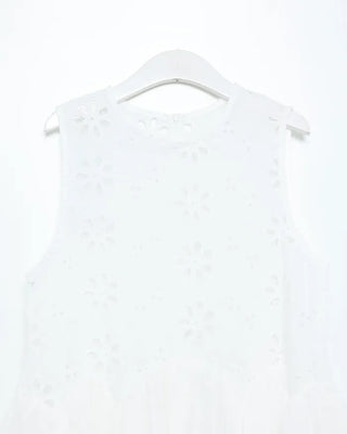 Perforated ruffle sleeveless top