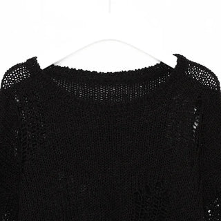 Damaged perforated knit