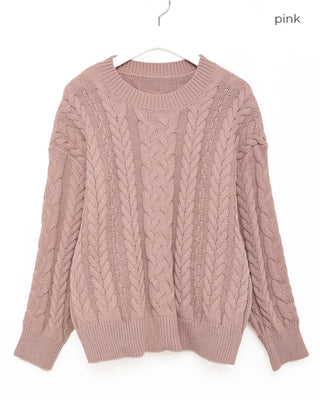 Loose-fitting cable knit round neck sweater