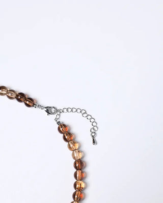 Clear brown ball necklace
