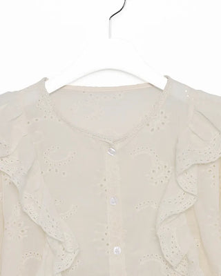Punched ruffle blouse