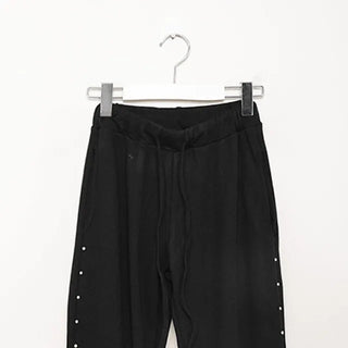 Side-studded knit flared pants