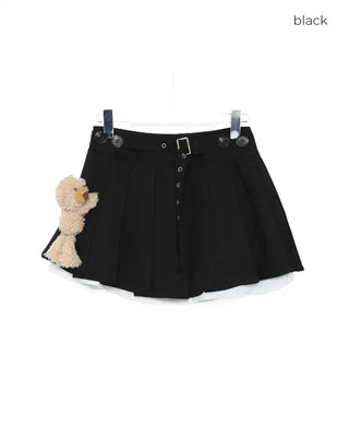 Animal brooch set with very short pleated skirt