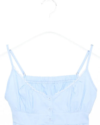 Half-button peplum camisole