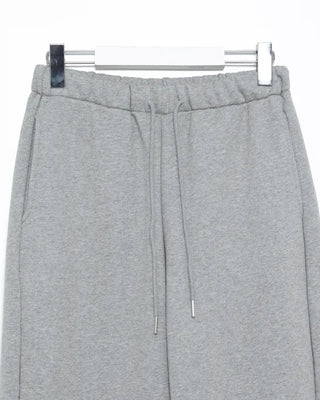 Open-heel ribbed knee-high socks layered pants