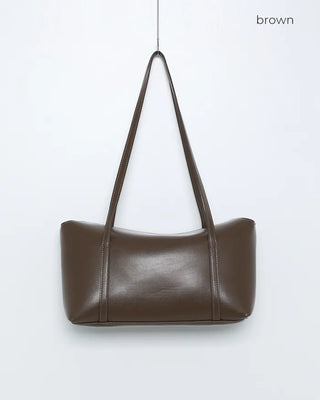 Slide pocket shoulder bag