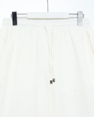Side-tuck flap hip pocket easy pants