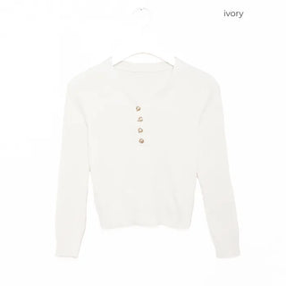 V-neck ribbed knit with gold buttons.